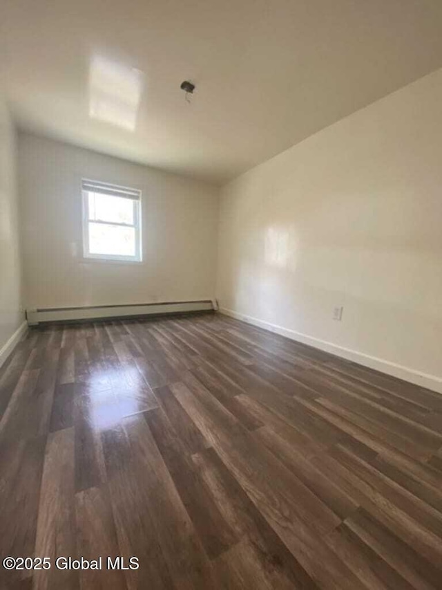 18 Railroad Ave, Berlin, NY 12022 - unfurnished room with dark wood finished floors and a baseboard radiator
