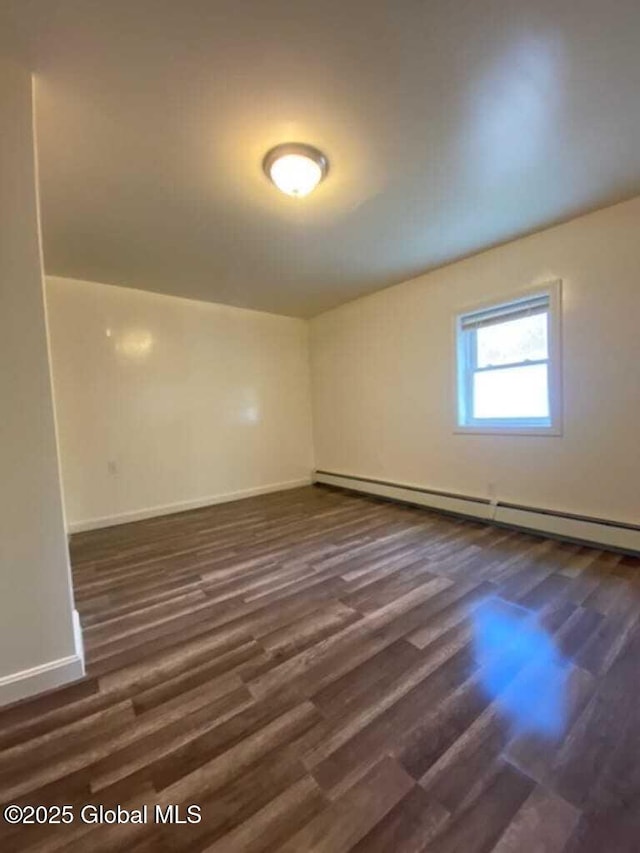 18 Railroad Ave, Berlin, NY 12022 - unfurnished room featuring a baseboard radiator and dark wood finished floors