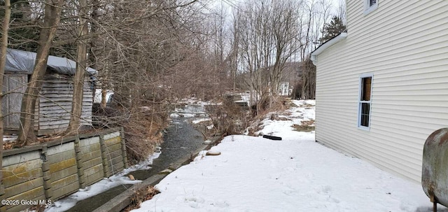 18 Railroad Ave, Berlin, NY 12022 - snowy yard featuring oil tank