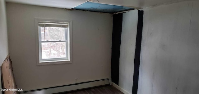 18 Railroad Ave, Berlin, NY 12022 - spare room with a baseboard radiator and dark wood-style floors