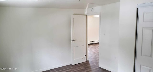 18 Railroad Ave, Berlin, NY 12022 - empty room featuring a baseboard radiator and dark wood-style flooring
