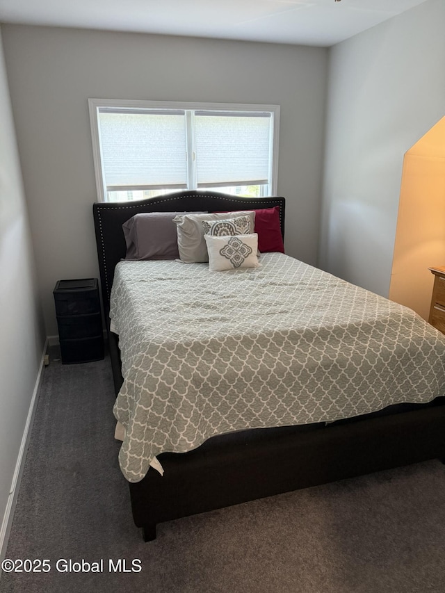 7048 Suzanne Ln, Guilderland, NY 12303 - carpeted bedroom featuring multiple windows
