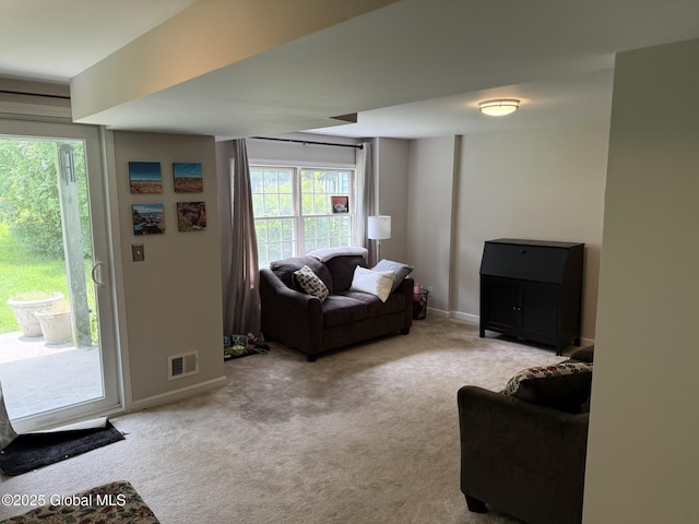 7048 Suzanne Ln, Guilderland, NY 12303 - carpeted living area with plenty of natural light