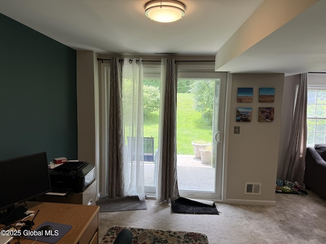 7048 Suzanne Ln, Guilderland, NY 12303 - doorway to outside with carpet floors and baseboards