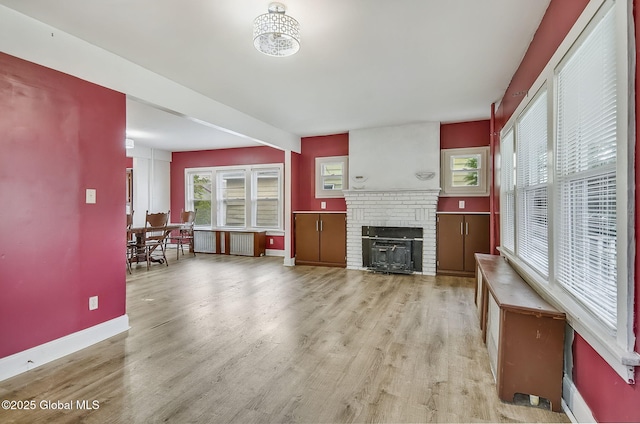 134 Whitehall Rd, Albany, NY 12209 - unfurnished living room with wood finished floors and a fireplace