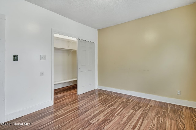 134 Whitehall Rd, Albany, NY 12209 - unfurnished bedroom featuring wood finished floors, a closet, and a textured ceiling