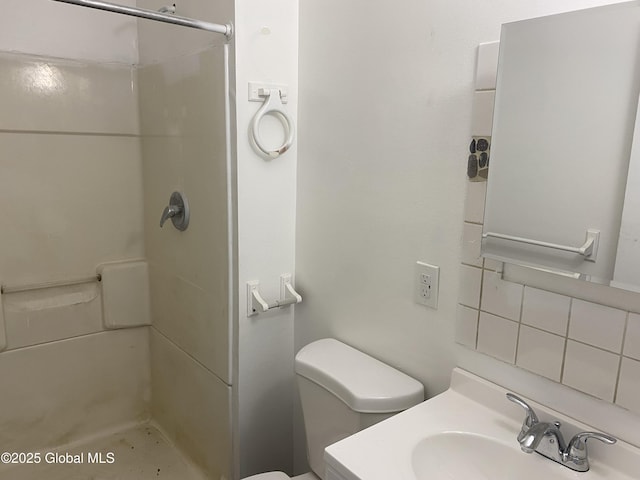 629 Lang St, Schenectady, NY 12308 - full bath with a shower, vanity, and decorative backsplash