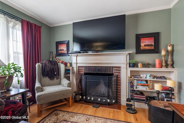 2305 Balltown Rd, Niskayuna, NY 12309 - living room featuring ornamental molding, wood finished floors, and a brick fireplace