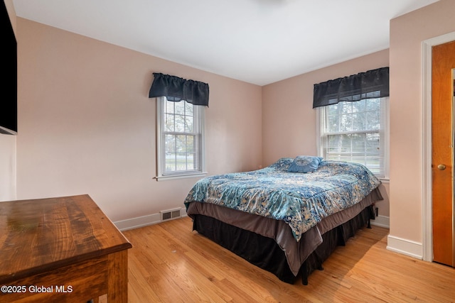 2305 Balltown Rd, Niskayuna, NY 12309 - bedroom featuring baseboards and wood finished floors