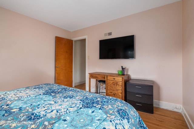 2305 Balltown Rd, Niskayuna, NY 12309 - bedroom with light wood-style flooring and baseboards
