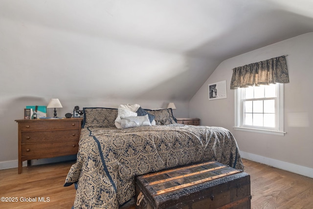2305 Balltown Rd, Niskayuna, NY 12309 - bedroom with vaulted ceiling and wood finished floors