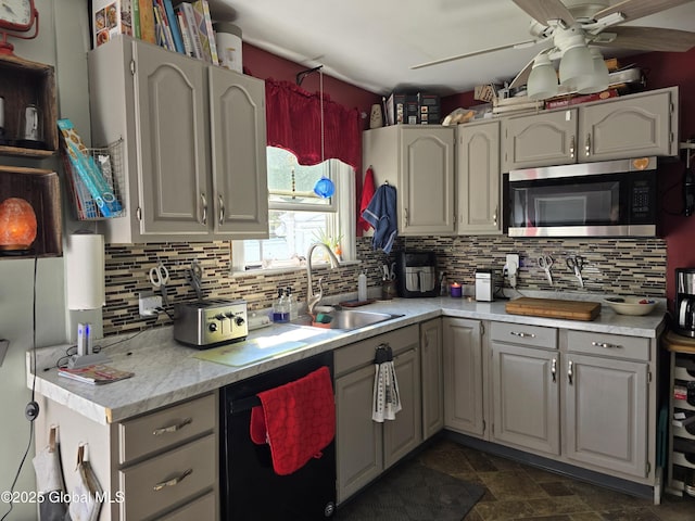 2922 Halsey Dr, Schenectady, NY 12304 - kitchen featuring dishwashing machine, stainless steel microwave, gray cabinets, and ceiling fan