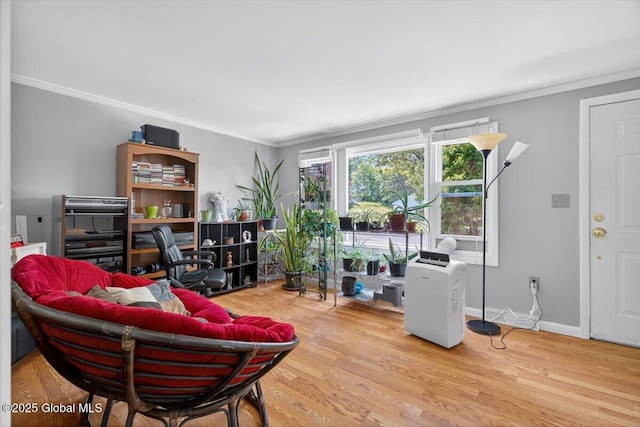 303 E Washington Ave, Rensselaer, NY 12144 - living room with ornamental molding, wood finished floors, and a desk