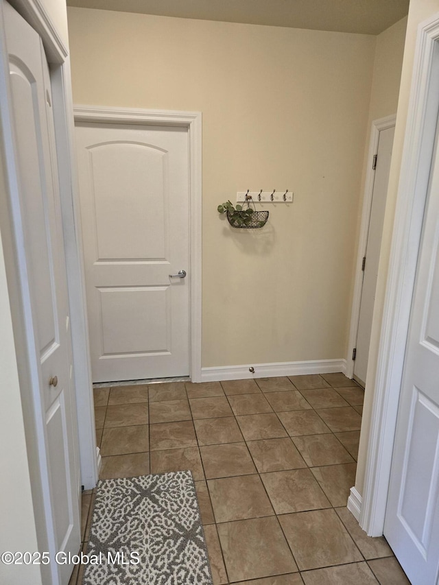 8 Wall St Unit 236, Clifton Park, NY 12065 - corridor featuring tile patterned flooring and baseboards