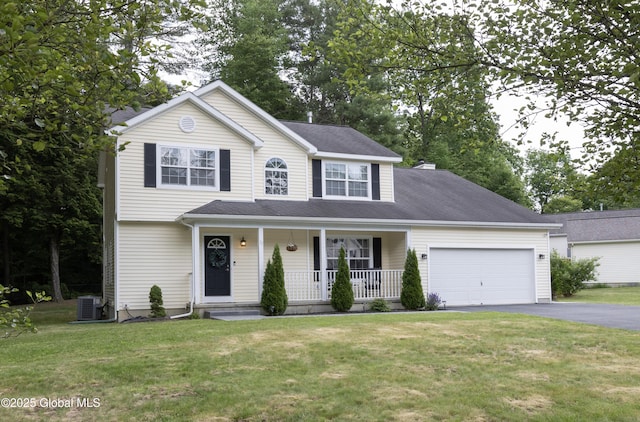 22 Santee Dr, Wilton, NY 12831 - traditional home featuring a porch, driveway, an attached garage, and a front lawn