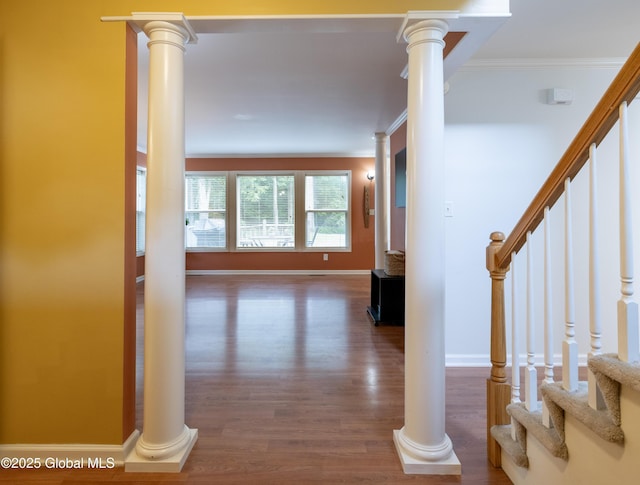 22 Santee Dr, Wilton, NY 12831 - corridor featuring wood finished floors, stairs, and crown molding