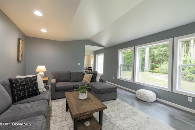 22 Santee Dr, Wilton, NY 12831 - living room with wood finished floors, lofted ceiling, and recessed lighting