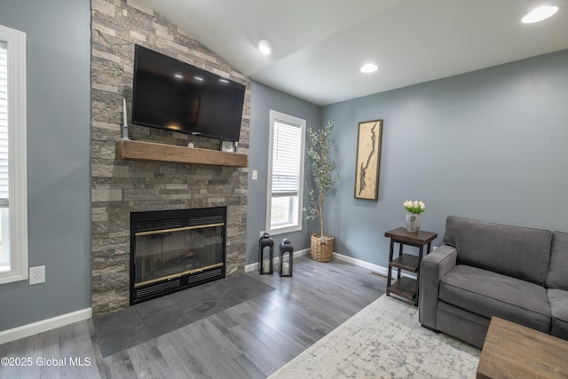 22 Santee Dr, Wilton, NY 12831 - living room with wood finished floors, a fireplace, and lofted ceiling