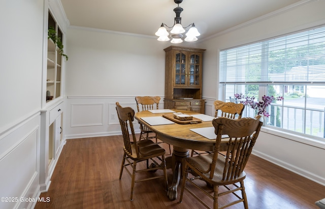 22 Santee Dr, Wilton, NY 12831 - dining area with a chandelier, wood finished floors, crown molding, and wainscoting