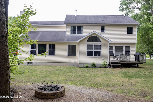 22 Santee Dr, Wilton, NY 12831 - rear view of house featuring an outdoor fire pit, a deck, and a lawn