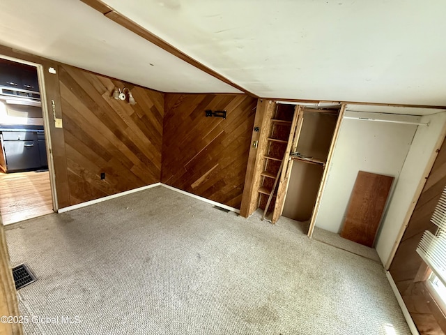 1612 Rte 9, Moreau, NY 12828 - unfurnished bedroom with carpet flooring and wood walls