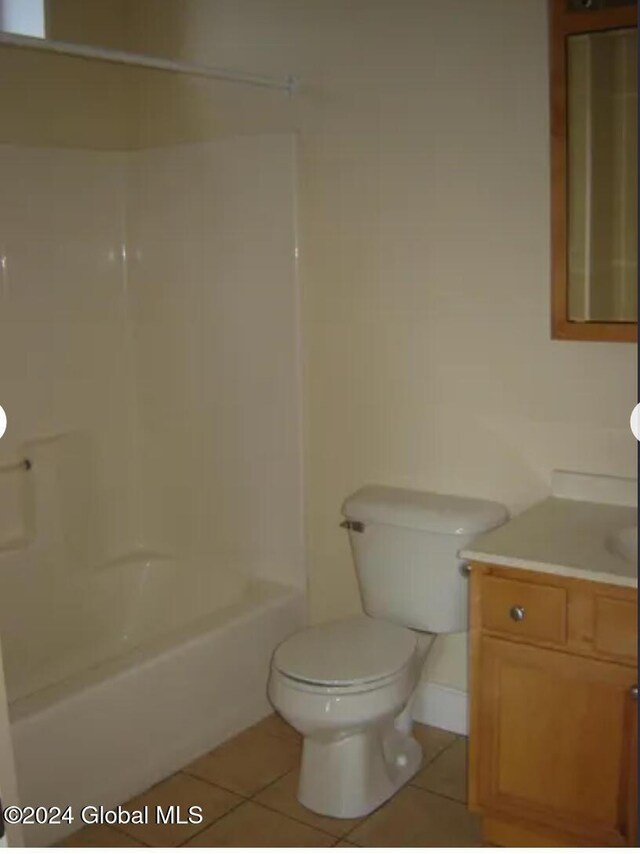 57 Dove St, Albany, NY 12210 - full bathroom featuring tile patterned floors, vanity, and tub / shower combination