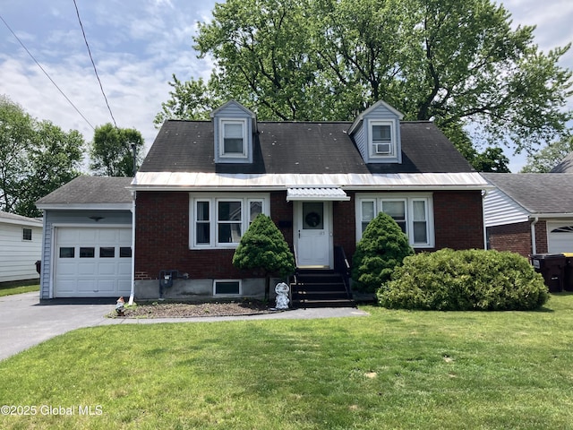 185 Butler St, Schenectady, NY 12303 - cape cod home featuring brick siding, an attached garage, a front lawn, and driveway