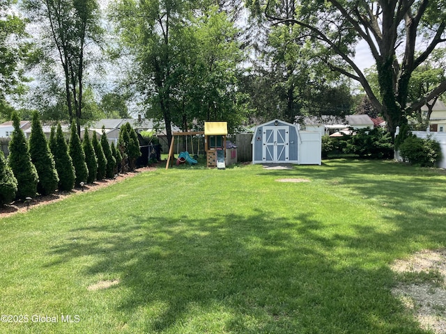 185 Butler St, Schenectady, NY 12303 - view of yard featuring a storage unit and a playground