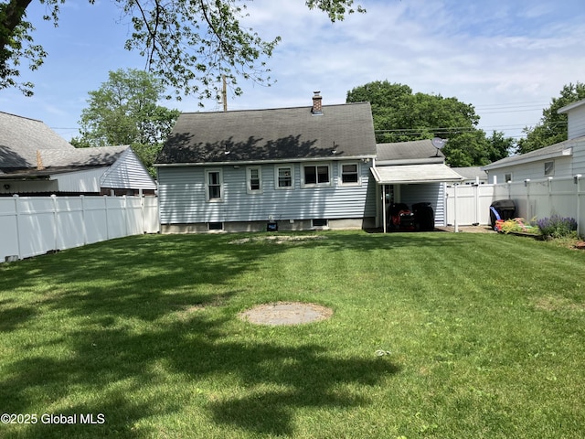 185 Butler St, Schenectady, NY 12303 - back of property with a carport and a chimney