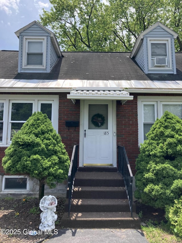 185 Butler St, Schenectady, NY 12303 - view of front of house with brick siding and cooling unit