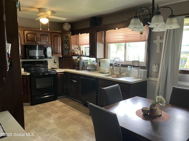 185 Butler St, Schenectady, NY 12303 - kitchen featuring black appliances, light countertops, plenty of natural light, and ceiling fan
