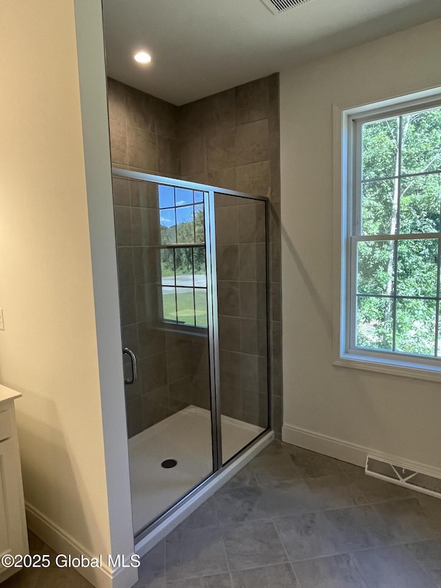 LOT19 Windrow Way, Halfmoon, NY 12118 - bathroom featuring healthy amount of natural light, a shower stall, vanity, and recessed lighting