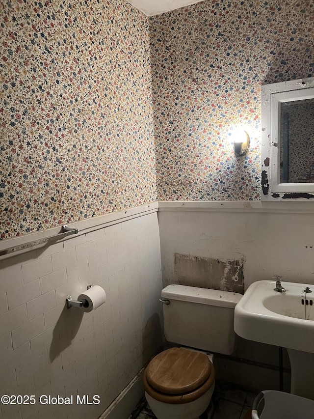 13 Wheeler, Canajoharie Village, NY 13317 - half bathroom featuring a wainscoted wall and toilet