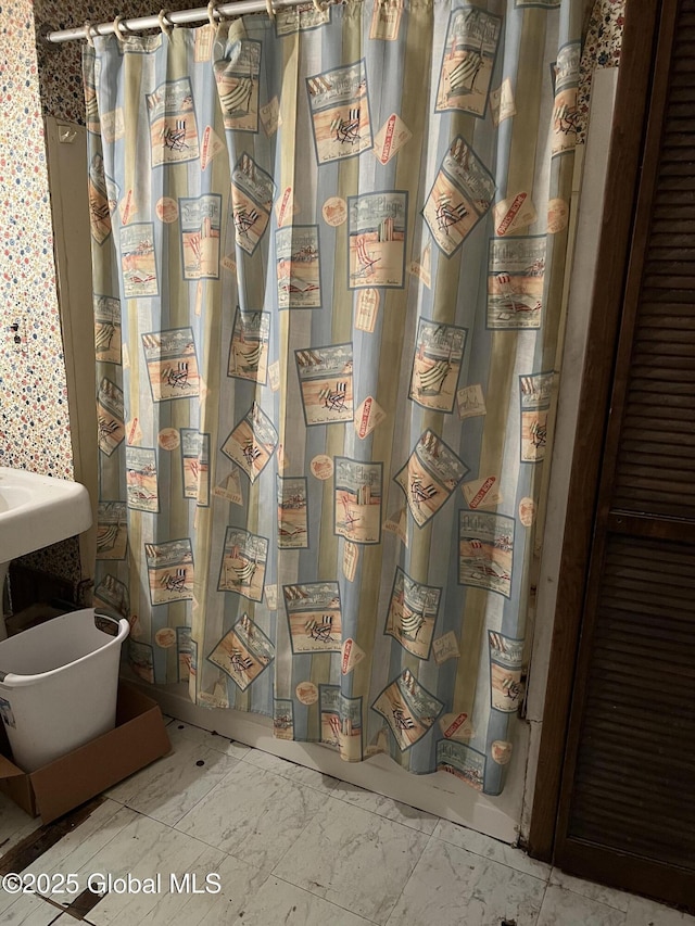 13 Wheeler, Canajoharie Village, NY 13317 - bathroom with marble finish flooring, gas water heater, water heater, and curtained shower