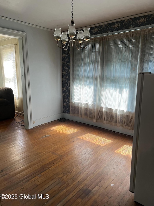 13 Wheeler, Canajoharie Village, NY 13317 - unfurnished room with a chandelier, plenty of natural light, hardwood / wood-style floors, and crown molding
