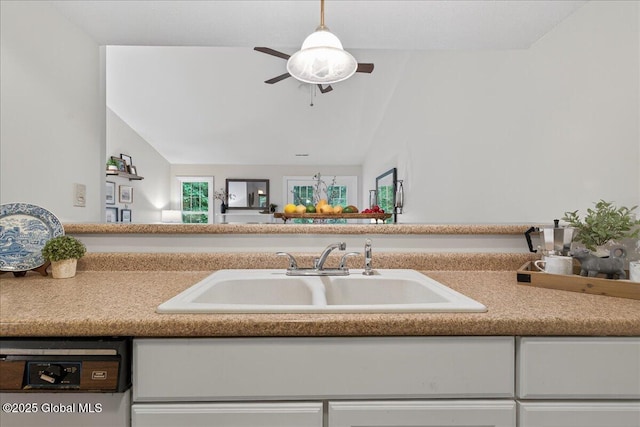 16 Whispering Pines Rd, Wilton, NY 12831 - kitchen featuring dishwasher, lofted ceiling, a ceiling fan, white cabinets, and light countertops