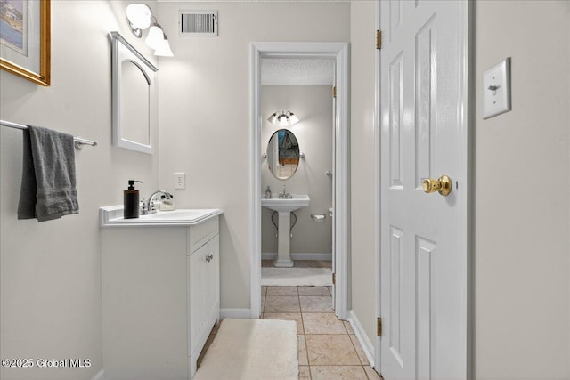 16 Whispering Pines Rd, Wilton, NY 12831 - bathroom with a sink and tile patterned floors