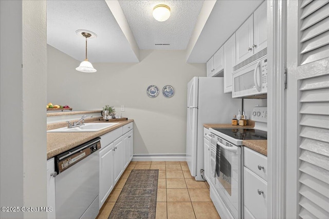 16 Whispering Pines Rd, Wilton, NY 12831 - kitchen with white appliances, white cabinets, a textured ceiling, light tile patterned floors, and pendant lighting