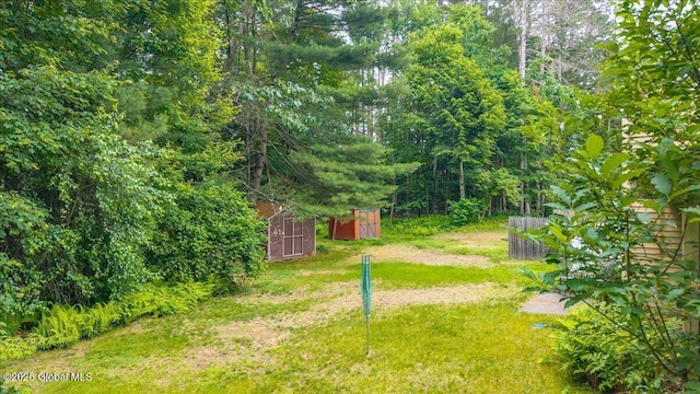 16 Whispering Pines Rd, Wilton, NY 12831 - view of green lawn featuring a shed