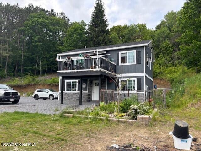 600 State Highway 309, Gloversville, NY 12078 - view of front of property with a deck and a wooded view