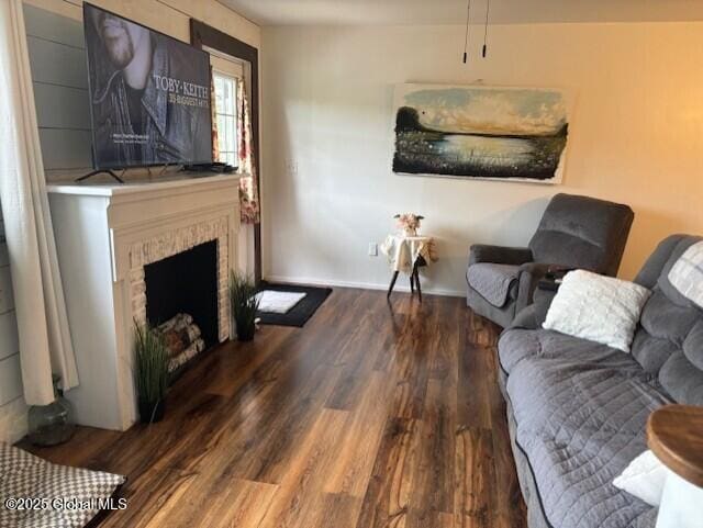 600 State Highway 309, Gloversville, NY 12078 - living area with wood finished floors and a fireplace