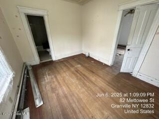 82 Mettowee St, Granville, NY 12832 - unfurnished bedroom featuring wood finished floors