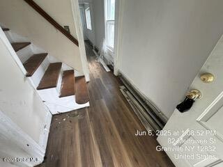 82 Mettowee St, Granville, NY 12832 - stairs featuring wood finished floors