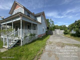 82 Mettowee St, Granville, NY 12832 - view of side of property with covered porch and driveway