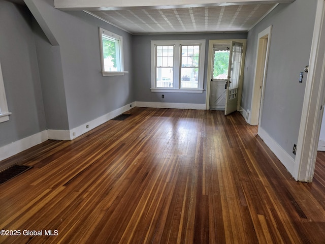 218 Sixteenth St, Schenectady, NY 12306 - unfurnished bedroom with baseboards and dark wood-style floors