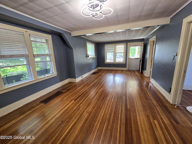 218 Sixteenth St, Schenectady, NY 12306 - unfurnished room featuring ornamental molding, dark wood-style floors, and a chandelier