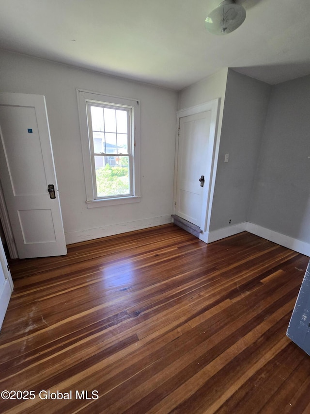 218 Sixteenth St, Schenectady, NY 12306 - unfurnished room with dark wood-style floors and baseboards