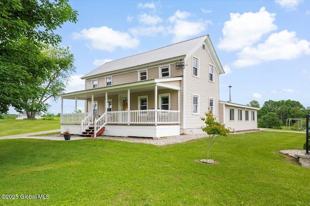 344 Fortsville Rd, Moreau, NY 12831 - farmhouse with a porch, a front yard, and a metal roof
