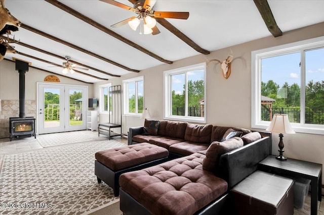 344 Fortsville Rd, Moreau, NY 12831 - living area with a ceiling fan and a wood stove