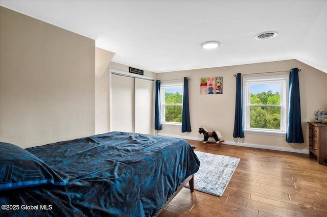 344 Fortsville Rd, Moreau, NY 12831 - bedroom with wood-type flooring and a closet